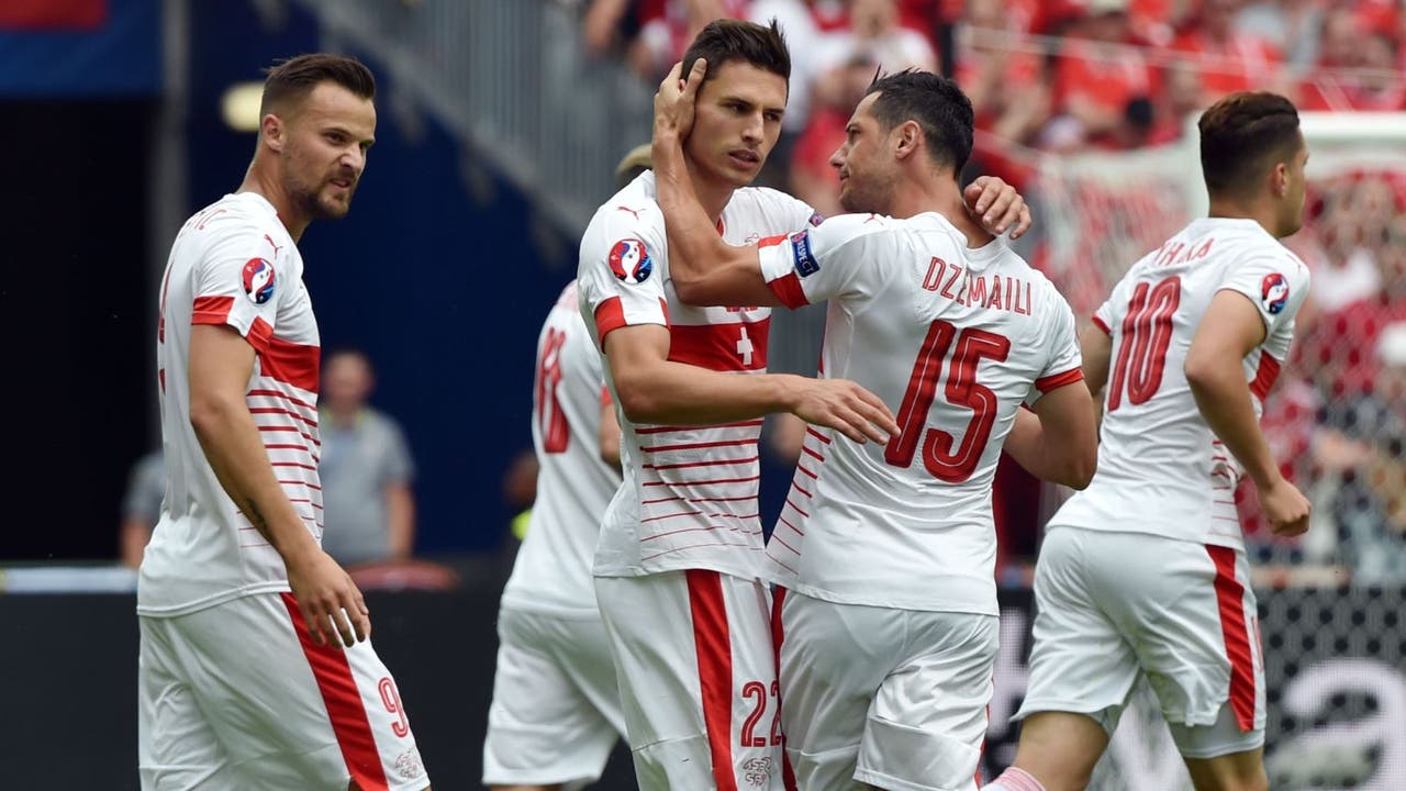 Schar helps Switzerland to tight victory over 10-man Albania